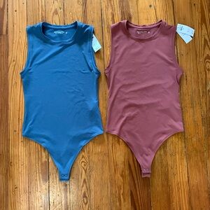 Bundle of two Abercrombie Crewneck Bodysuits - Blue and Red